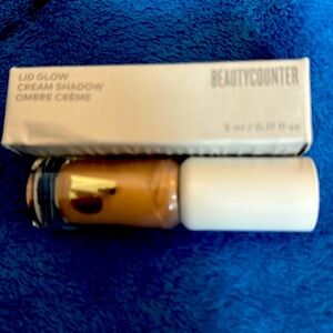Beautycounter lid glow in Auora